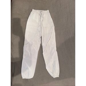 White glow joggers size S